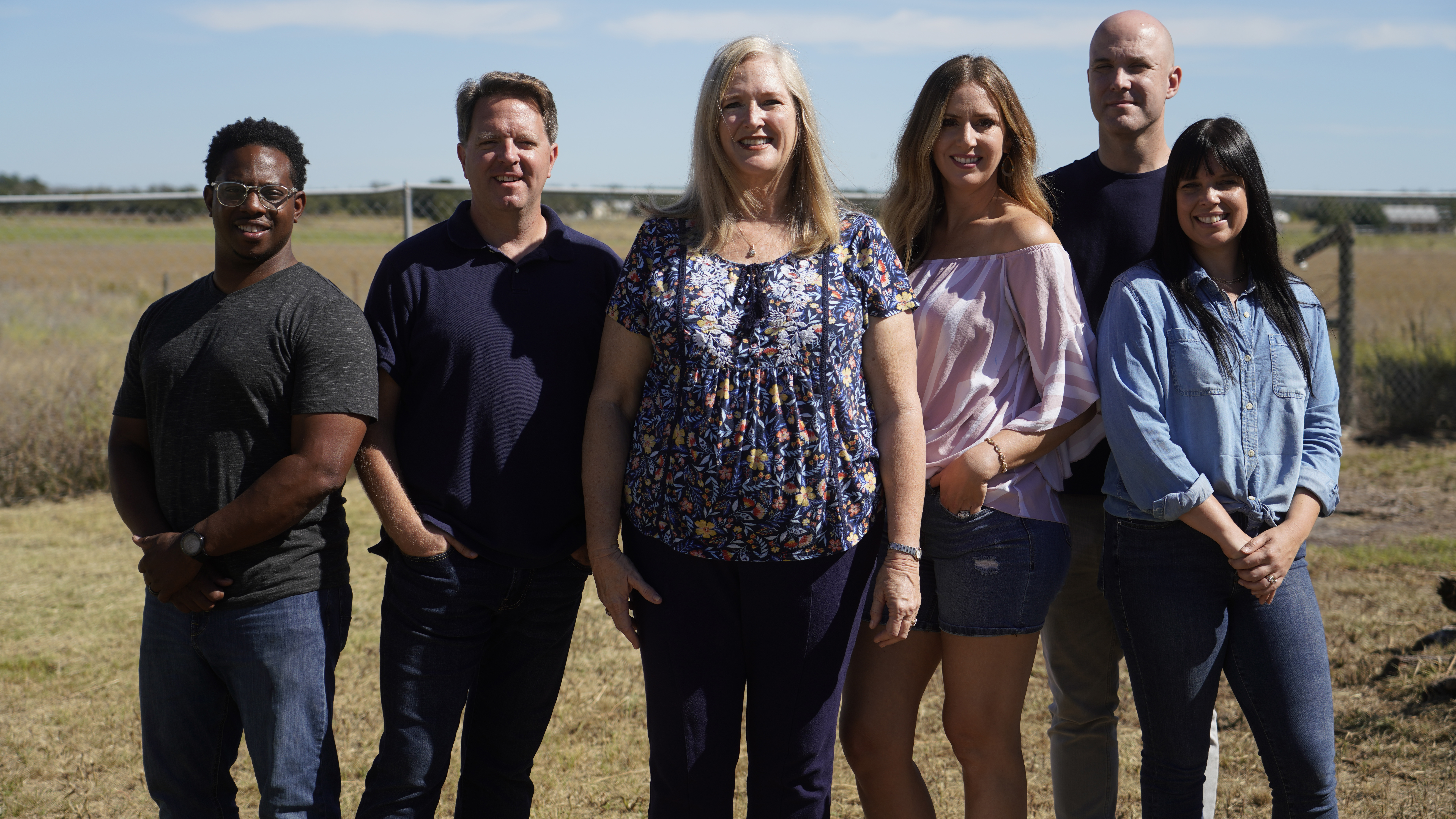 (From left to right) Avi Hopkins, Matt Paxton, homeowners Norm and Colleen, Mike Kelleher, and Jaime Ebanks in Fredericksburg, TX.. Photo Credits: Jhad Villena